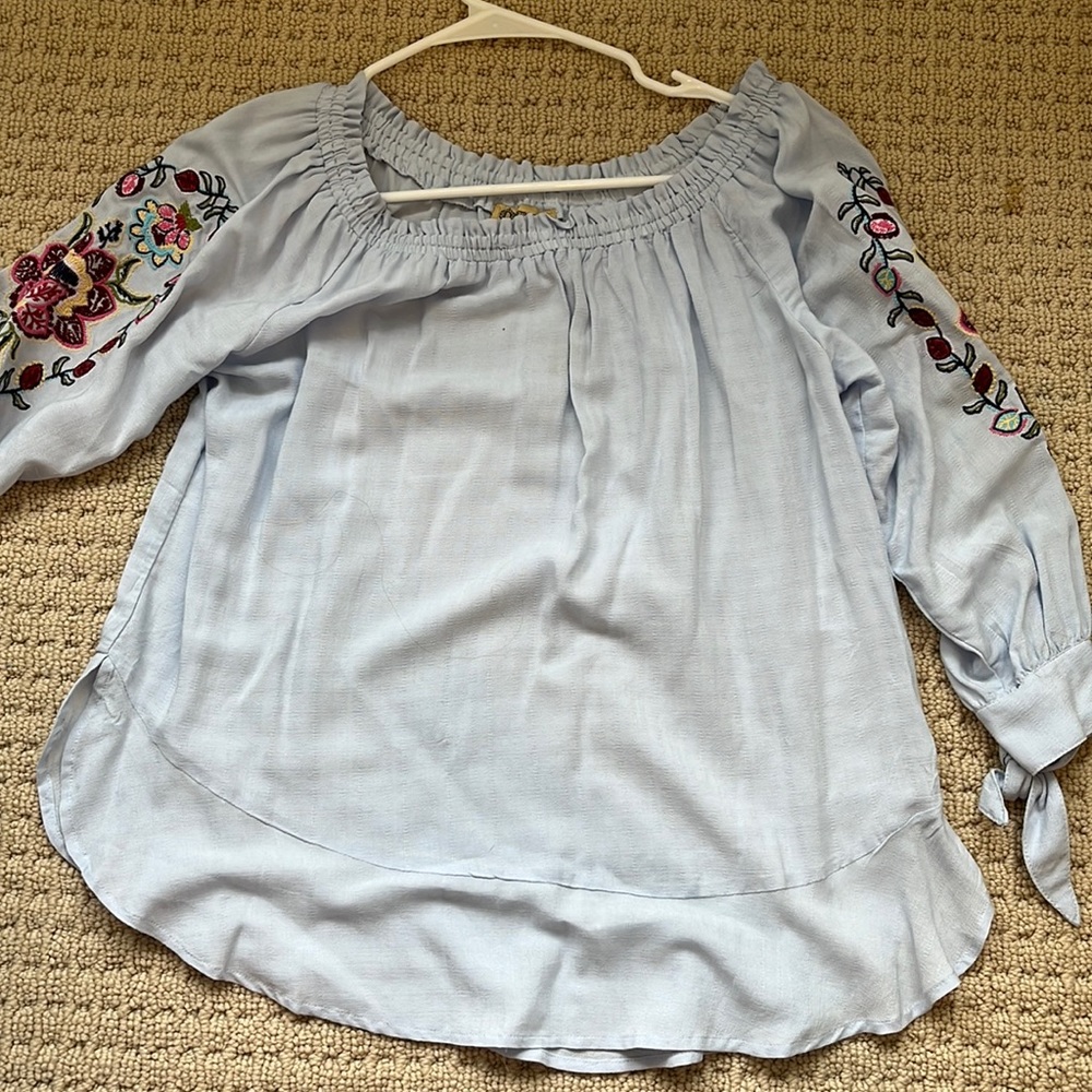 light blue small embroidered women’s off the shoulder blouse